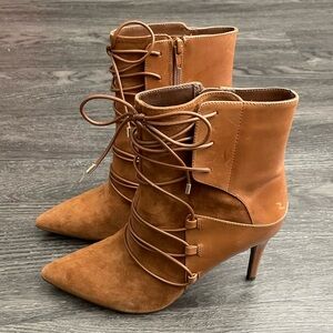 Never Worn Nine West Heels “THISISITO” 3 1/2 Inch Heel . Booties .